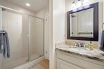 Step-in shower attached to queen room
